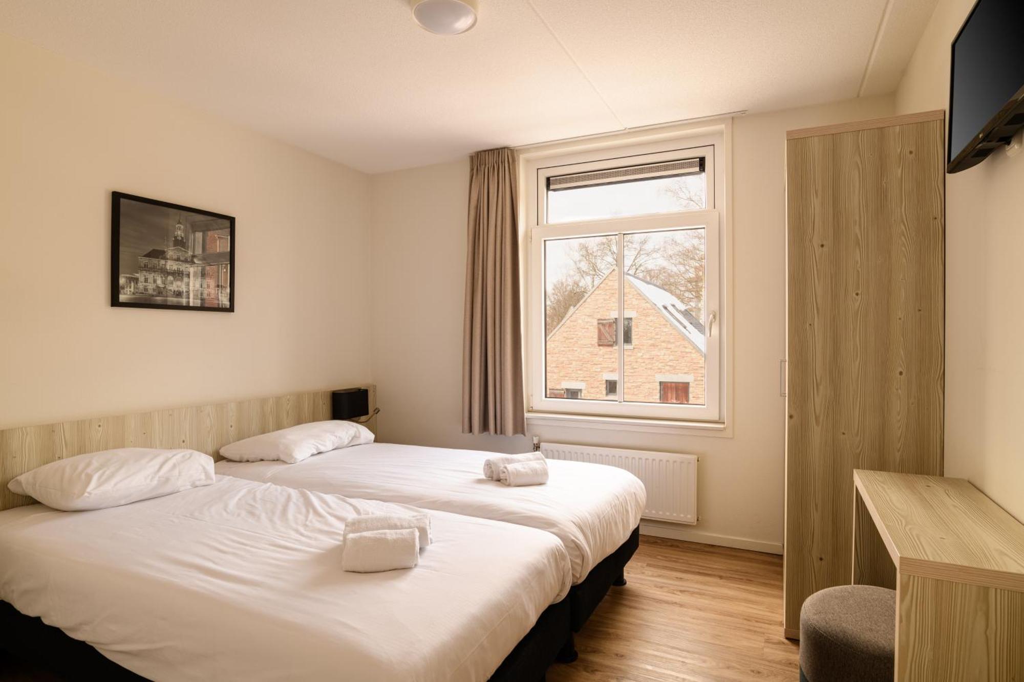 Dormio Resort Maastricht Rom bilde